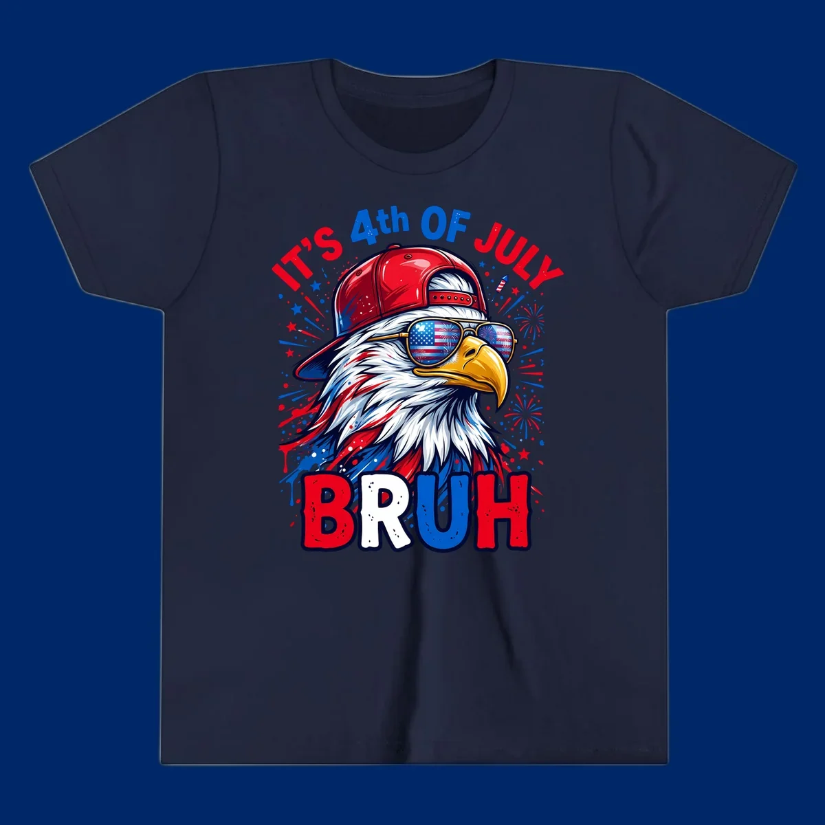 An illustrated bald eagle wearing a red cap and American flag sunglasses with fireworks and the text 'IT'S 4th OF JULY BRUH', emphasizing the fourth-of-july-bruh-eagle concept.
