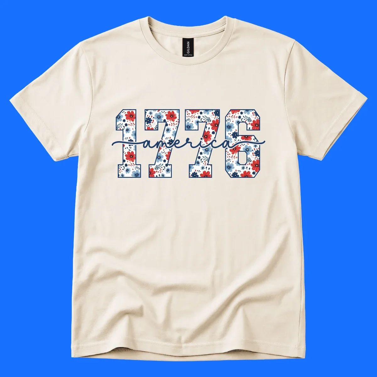 A design featuring the year 1776 with red and blue floral patterns inside each number, and the word 'america' in script below. The 1776-america-floral design is outlined in dark blue.