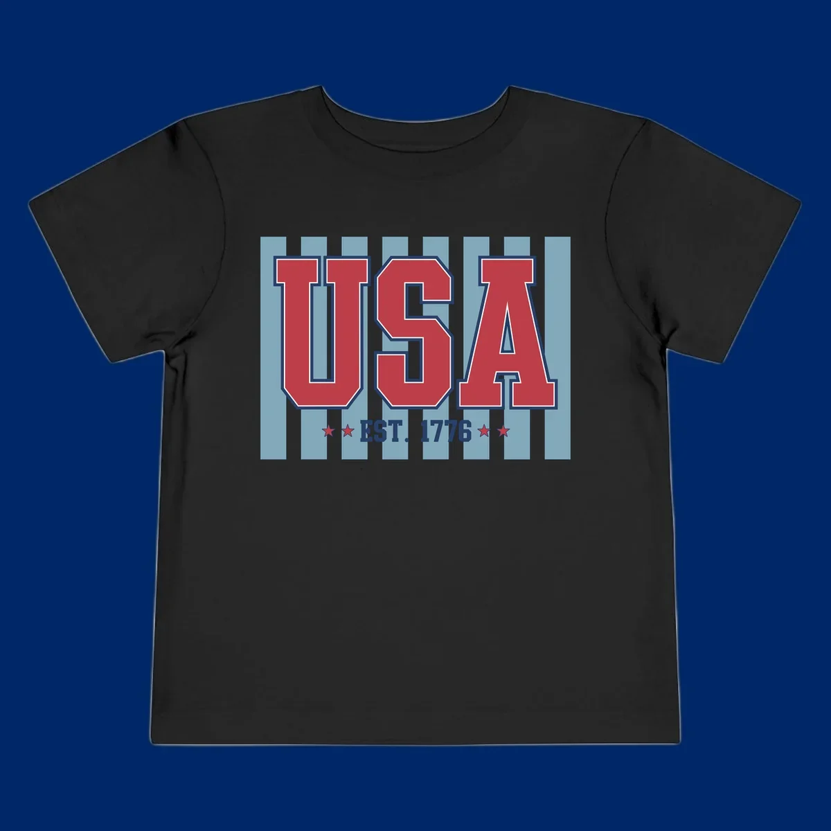 A patriotic design with large red 'USA' letters and 'EST. 1776' text, flanked by stars, against a striped background. usa-1776-founding-heritage.