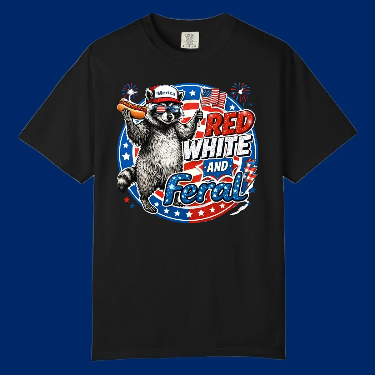 A patriotic-raccoon-feral illustration of a raccoon in a 'Merica hat, flag sunglasses, holding a hotdog and US flag. Text: RED WHITE AND Feral.
