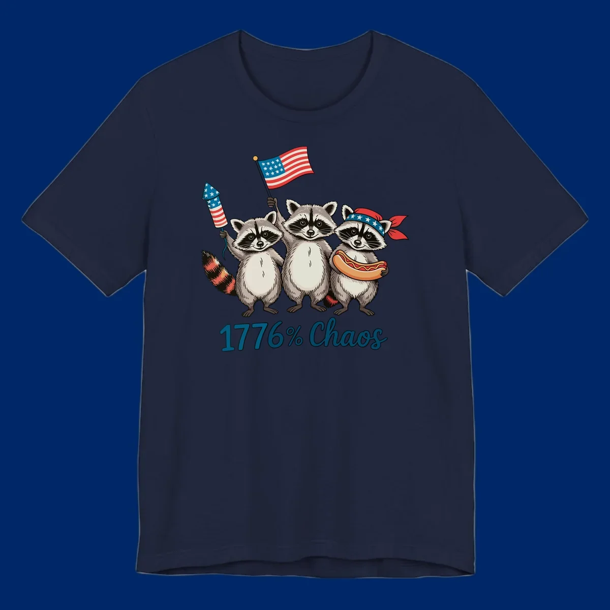 Illustration of three patriotic raccoons celebrating with an American flag, firework, and hot dog, with '1776% Chaos' text. Represents 1776-chaos-raccoons-celebration.