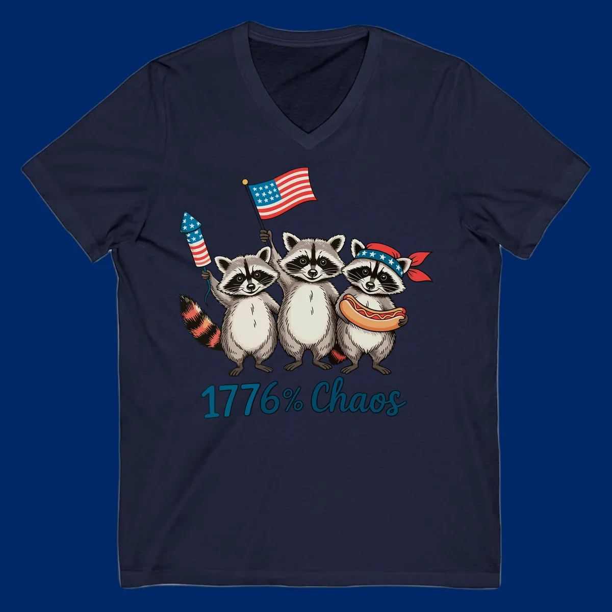 Illustration of three patriotic raccoons celebrating with an American flag, firework, and hot dog, with '1776% Chaos' text. Represents 1776-chaos-raccoons-celebration.