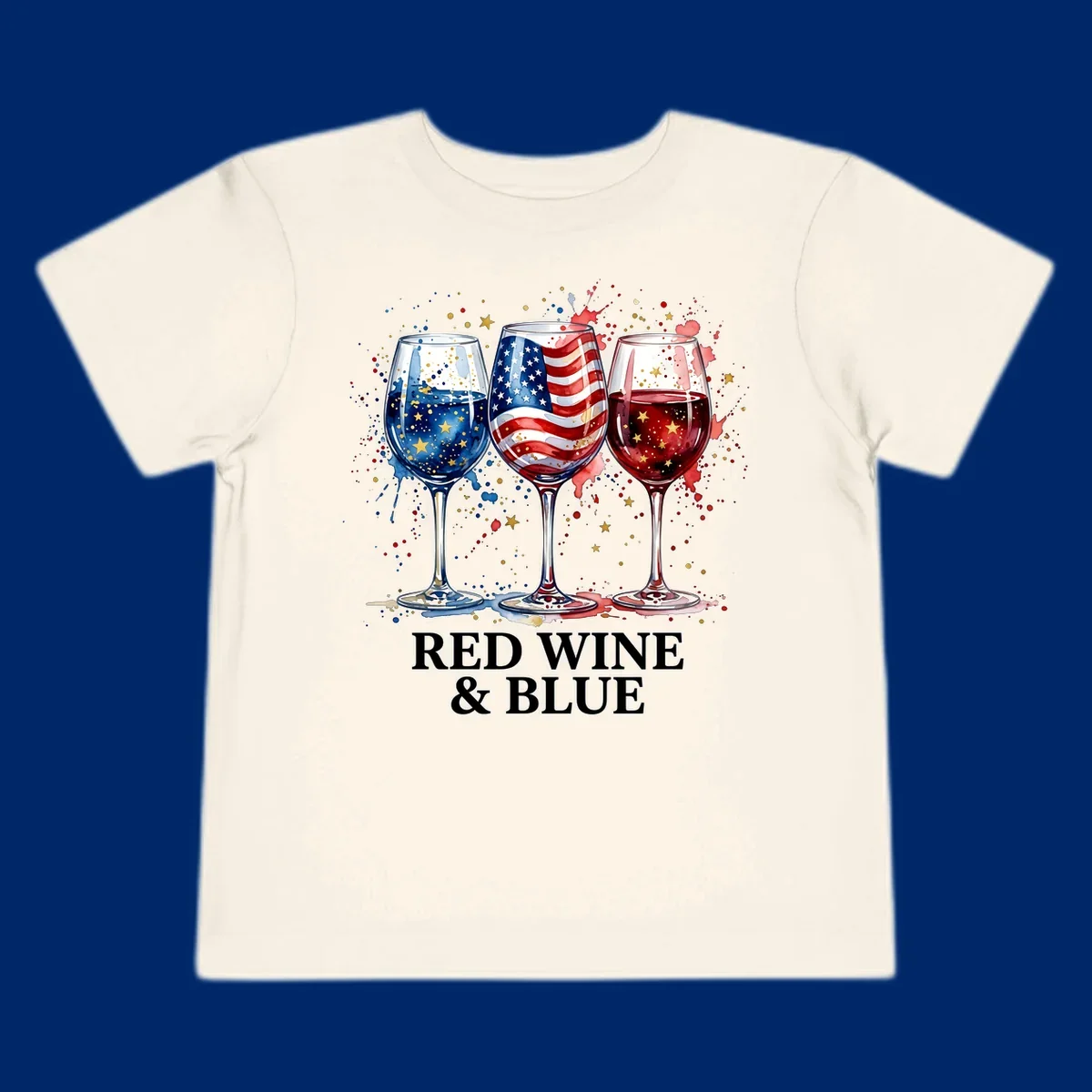 Watercolor illustration of three wine glasses, one with an American flag, one with blue liquid and gold stars, and one with red liquid and gold stars, with the text 'RED WINE & BLUE'. This red-wine-blue-patriotic design celebrates American heritage.