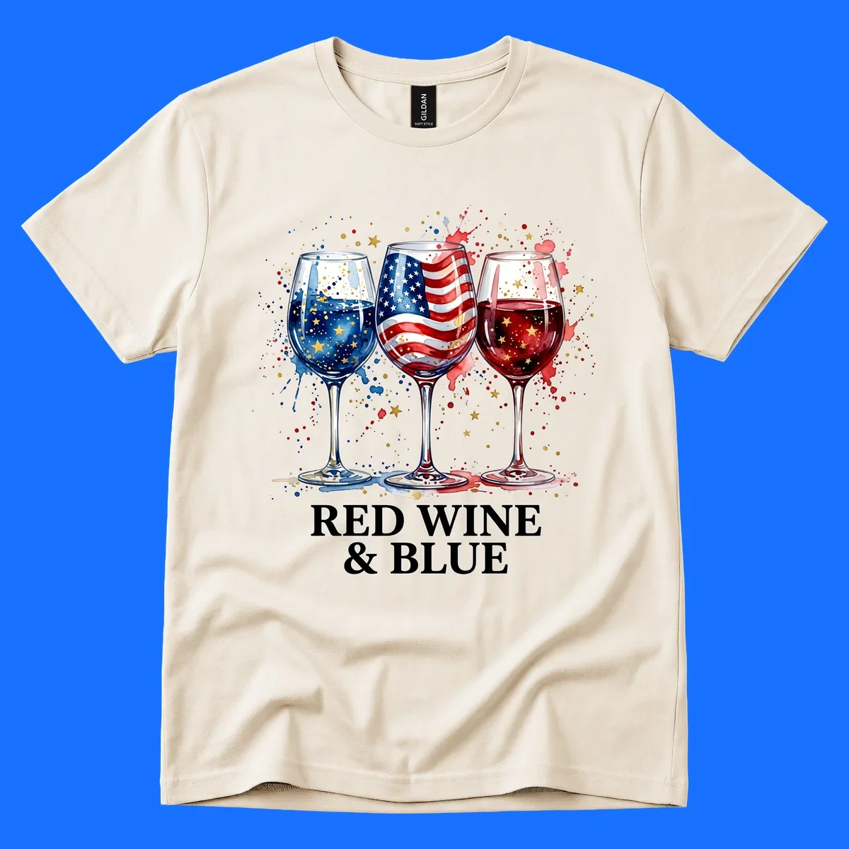 Watercolor illustration of three wine glasses, one with an American flag, one with blue liquid and gold stars, and one with red liquid and gold stars, with the text 'RED WINE & BLUE'. This red-wine-blue-patriotic design celebrates American heritage.