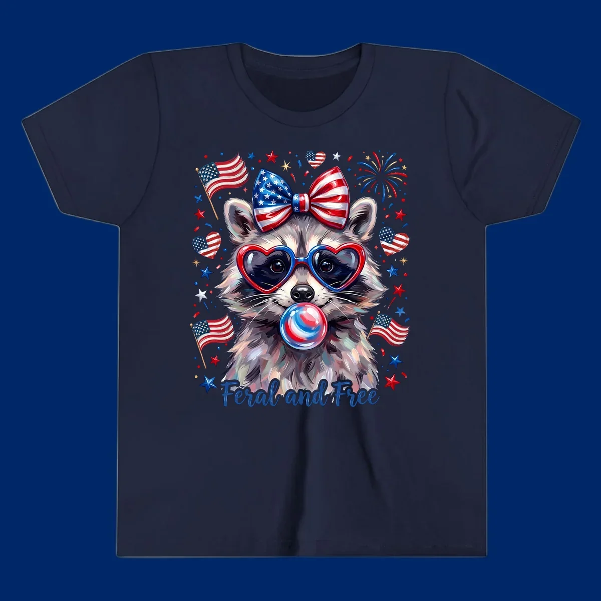 Watercolor illustration of a patriotic raccoon wearing heart sunglasses, blowing bubblegum, with American flags, fireworks, and 'Feral and Free' text for a patriotic-raccoon-july-4th celebration.
