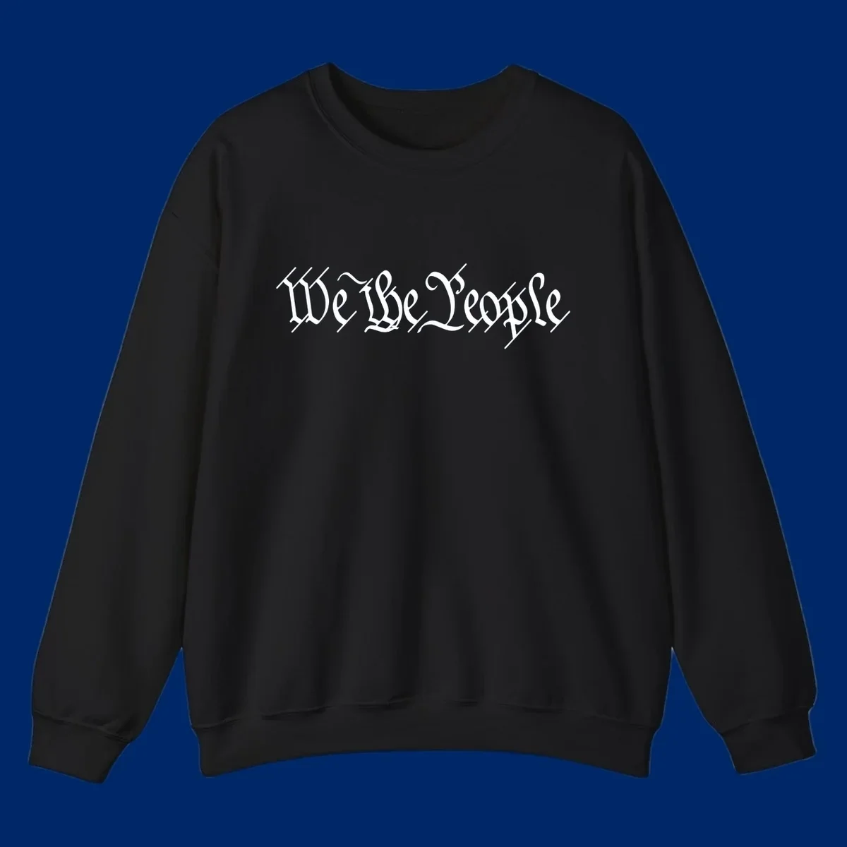 The phrase 'WE THE PEOPLE' is written in a decorative white calligraphic font, representing the we-the-people-heritage.