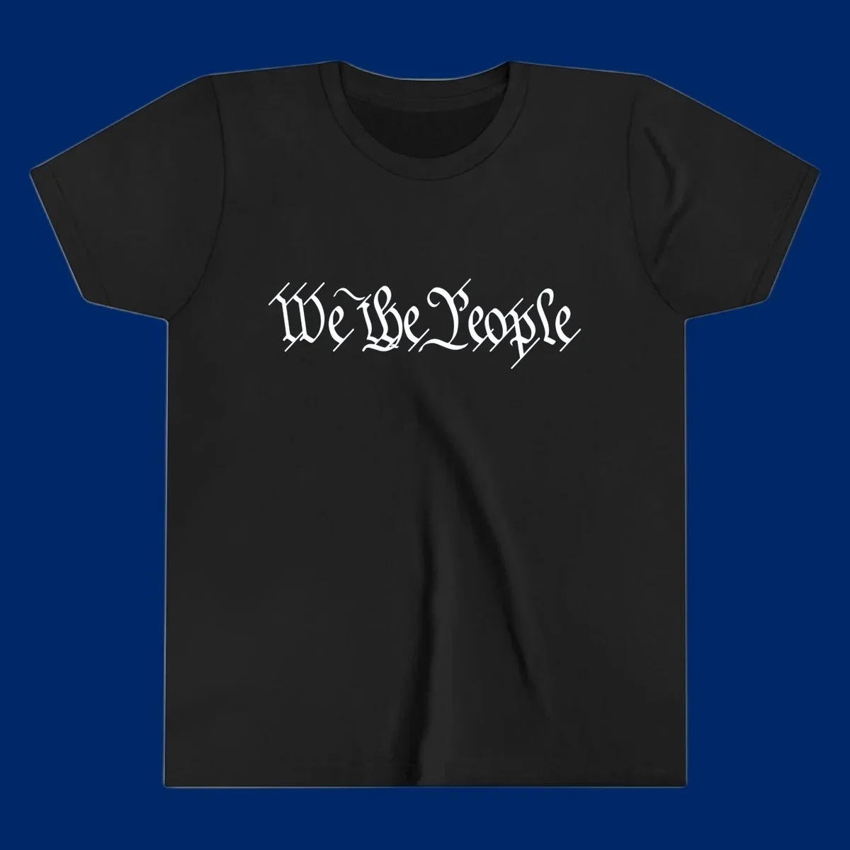 The phrase 'WE THE PEOPLE' is written in a decorative white calligraphic font, representing the we-the-people-heritage.