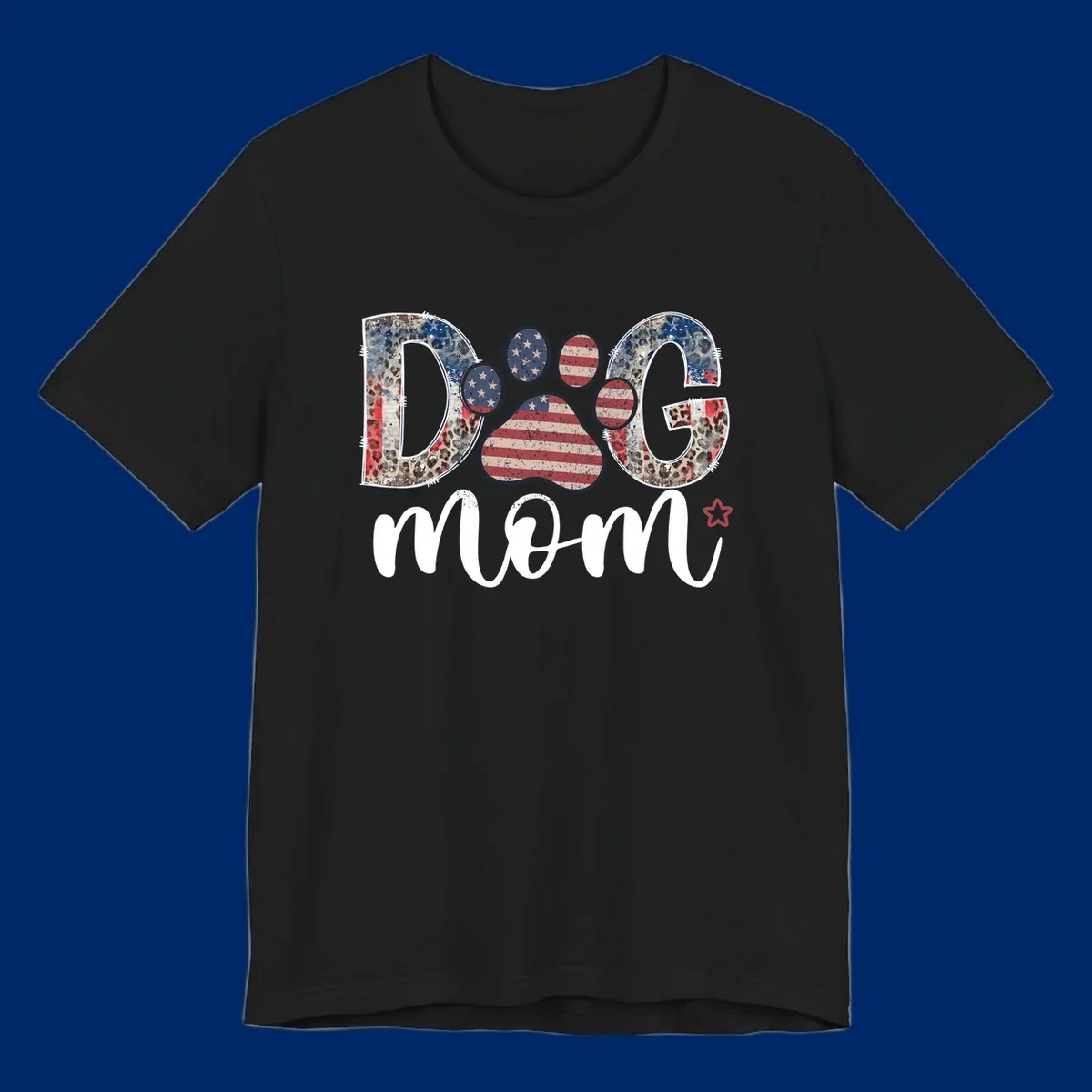 A graphic spelling 'DOG' with a patriotic-dog-paw-print. The 'D' and 'G' have leopard print and flag elements, and the 'O' is a flag paw print.