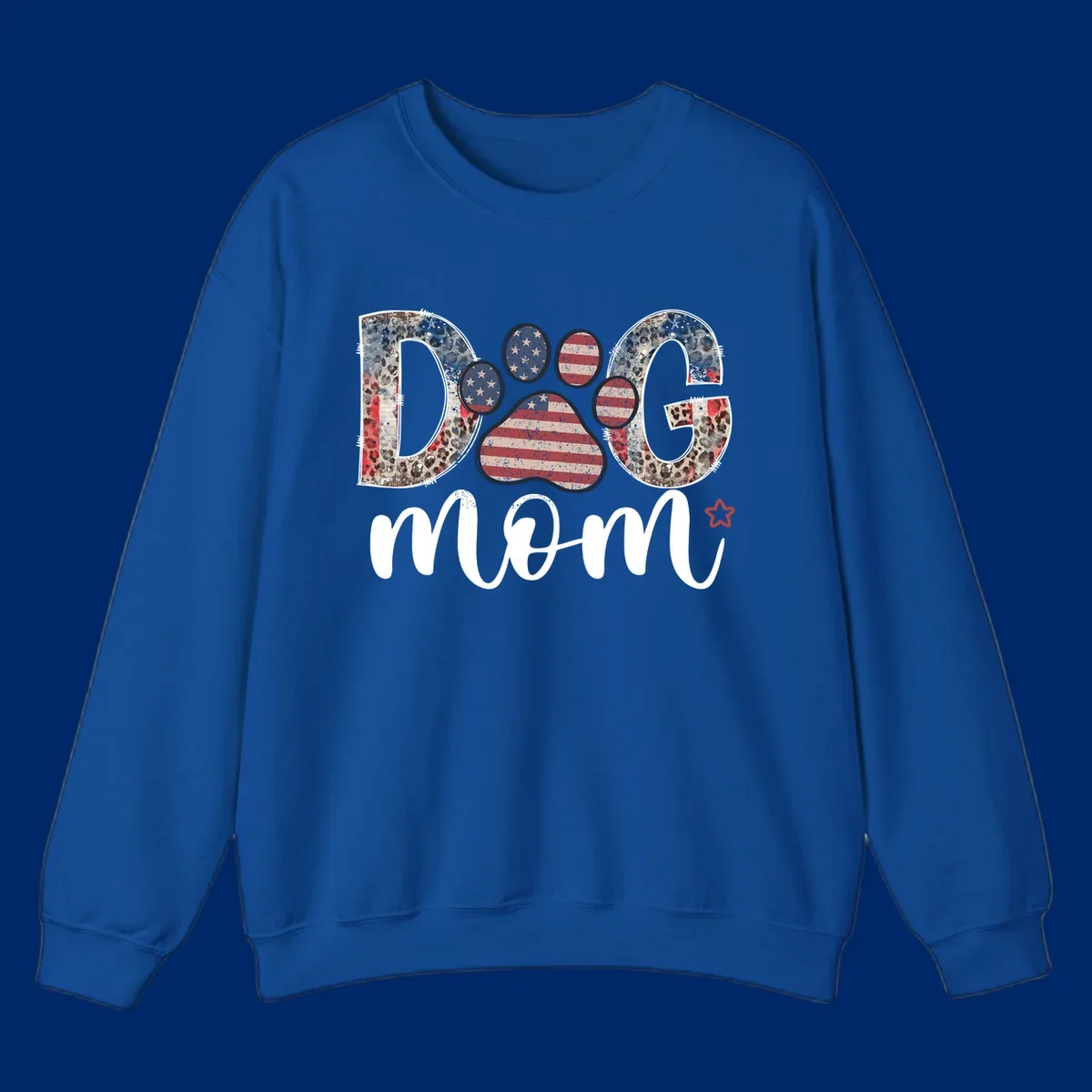 A graphic spelling 'DOG' with a patriotic-dog-paw-print. The 'D' and 'G' have leopard print and flag elements, and the 'O' is a flag paw print.