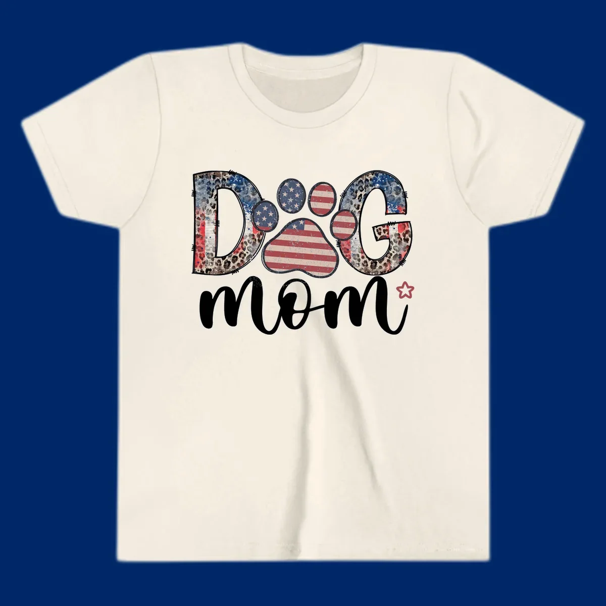 A graphic spelling 'DOG' with a patriotic-dog-paw-print. The 'D' and 'G' have leopard print and flag elements, and the 'O' is a flag paw print.