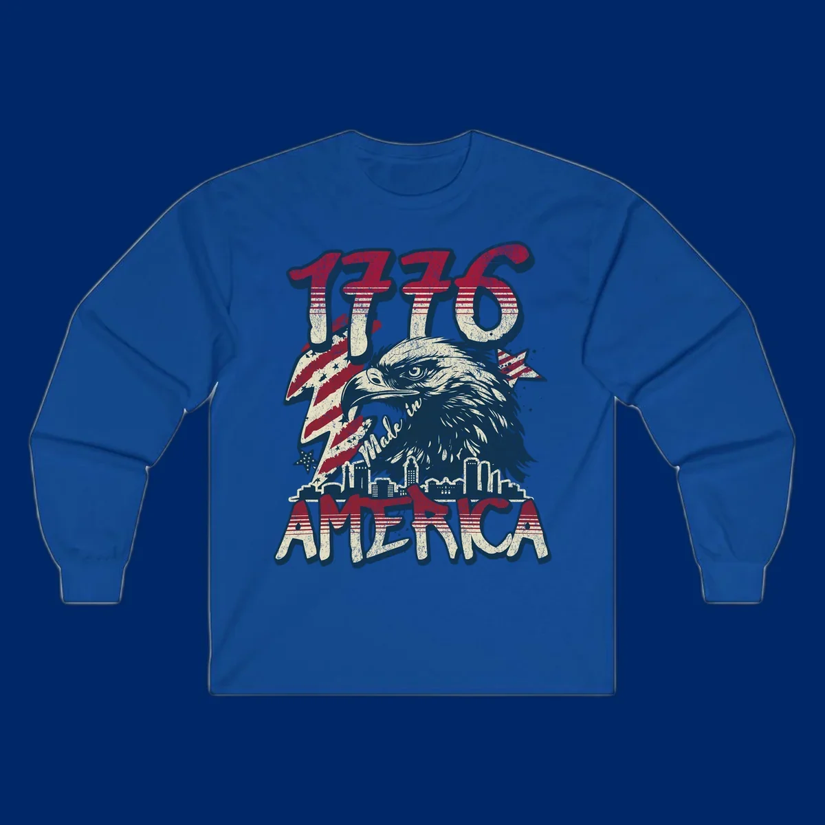 Vintage 1776 Made in America design with a bald eagle, city skyline, and American flag pattern. Features distressed red, cream, and navy colors.