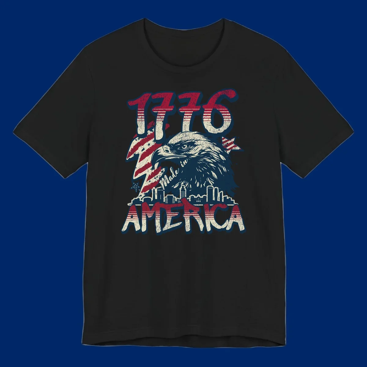 Vintage 1776 Made in America design with a bald eagle, city skyline, and American flag pattern. Features distressed red, cream, and navy colors.