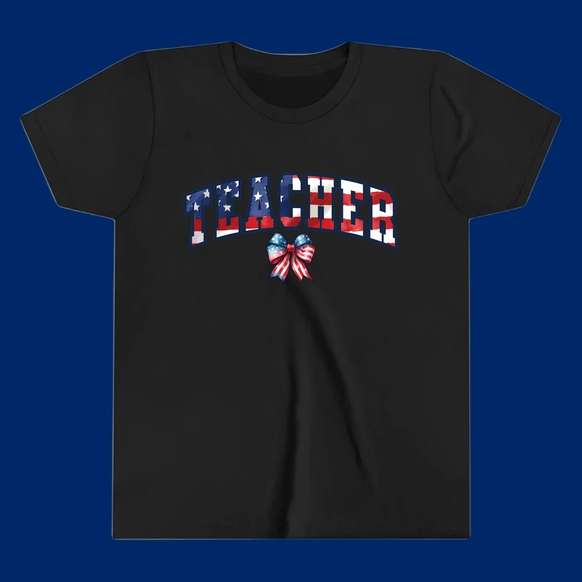 The word TEACHER in arched letters filled with an American flag pattern, featuring stars and stripes, with a patriotic bow below. Primary keyword root: patriotic-teacher-bow.