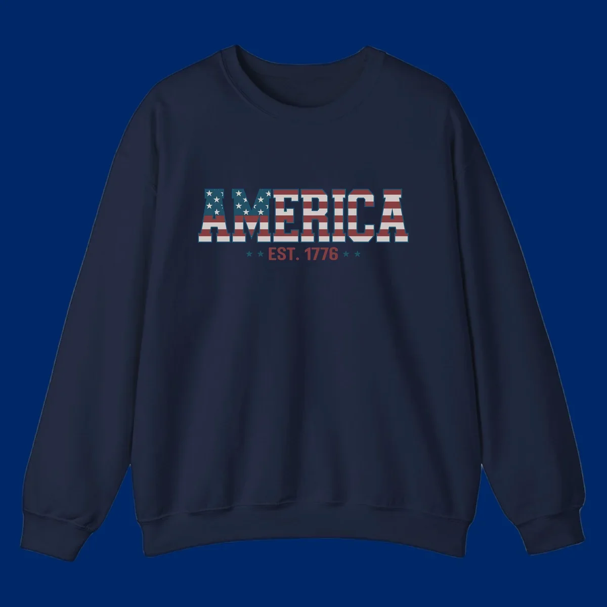The word AMERICA in large block letters filled with a distressed American flag pattern, with EST. 1776 below flanked by stars, representing america-established-1776.