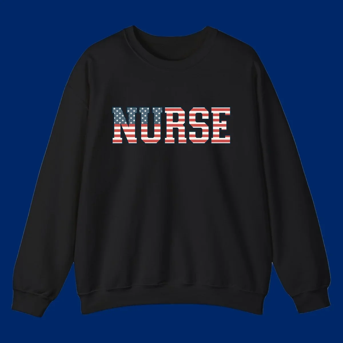 The word NURSE in bold capital letters, styled with American flag stars and stripes pattern, outlined in dark blue. Features patriotic nurse-american-flag-appreciation concept.
