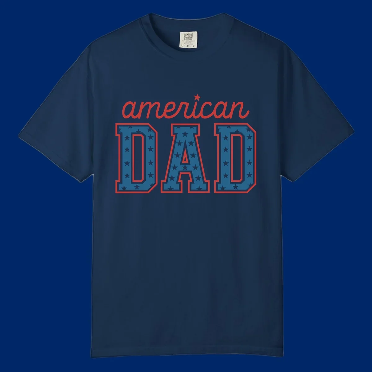 A patriotic design reading 'american DAD'. 'american' is red script with a star. 'DAD' is blue with white stars and a red outline, representing american-dad-patriotic-stars.