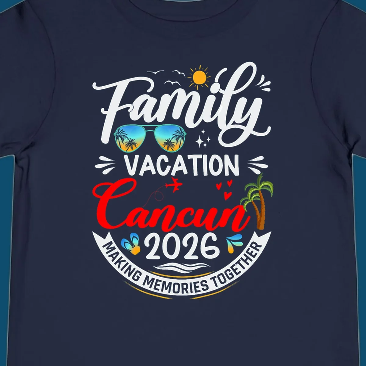 A vibrant "Family Cancun Vacation 2026" t-shirt design with a sun, birds, sunglasses, airplane, hearts, and palm trees.