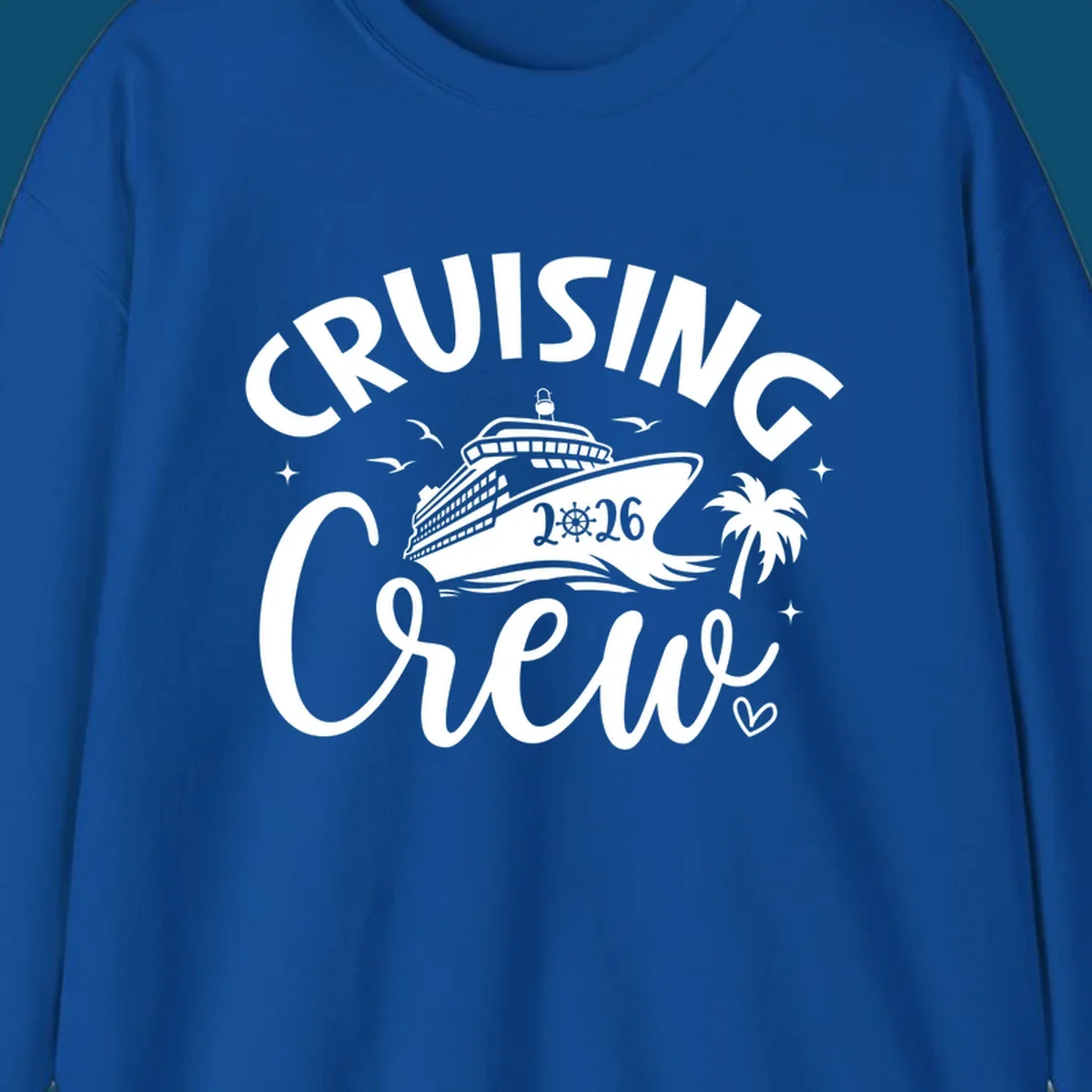 A white or navy graphic design for Cruising Crew 2026, featuring a cruise ship, palm tree, and seagulls.