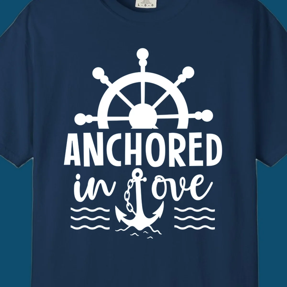 A 'Anchored in love cruise' design with a ship's wheel, the text ANCHORED in love, an anchor, and ocean waves.