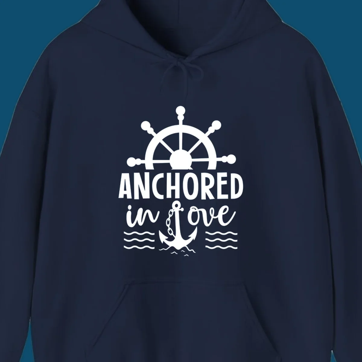 A 'Anchored in love cruise' design with a ship's wheel, the text ANCHORED in love, an anchor, and ocean waves.