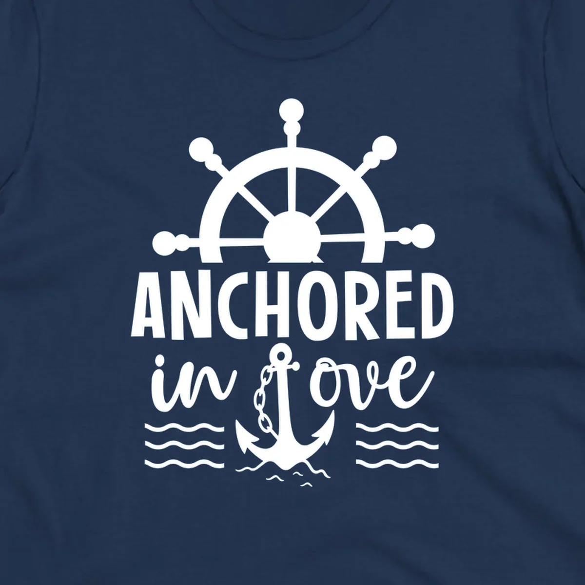 A 'Anchored in love cruise' design with a ship's wheel, the text ANCHORED in love, an anchor, and ocean waves.