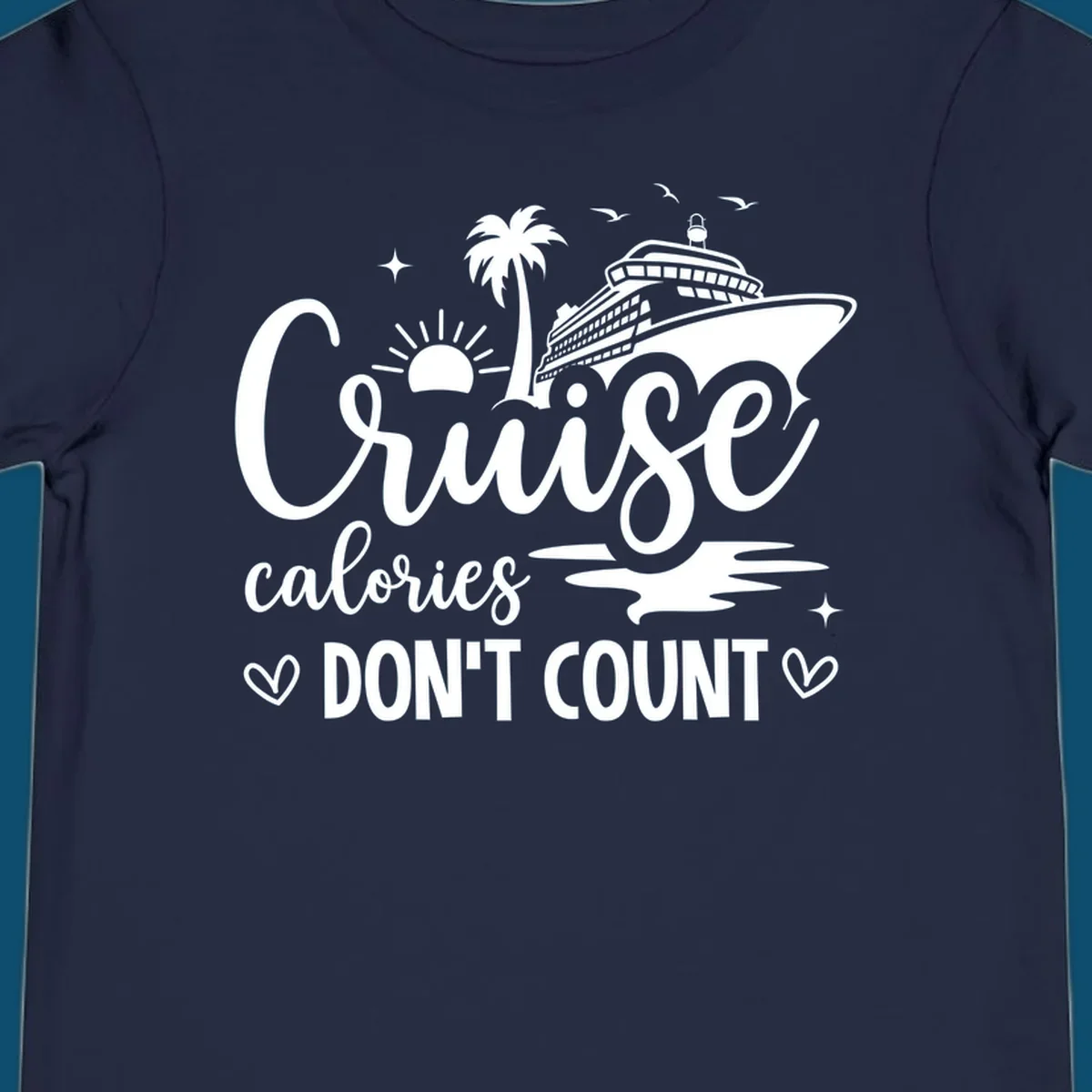 A design for a cruise shirt with a ship, palm tree, sun, and birds, and the text 'Cruise calories DON'T COUNT'.