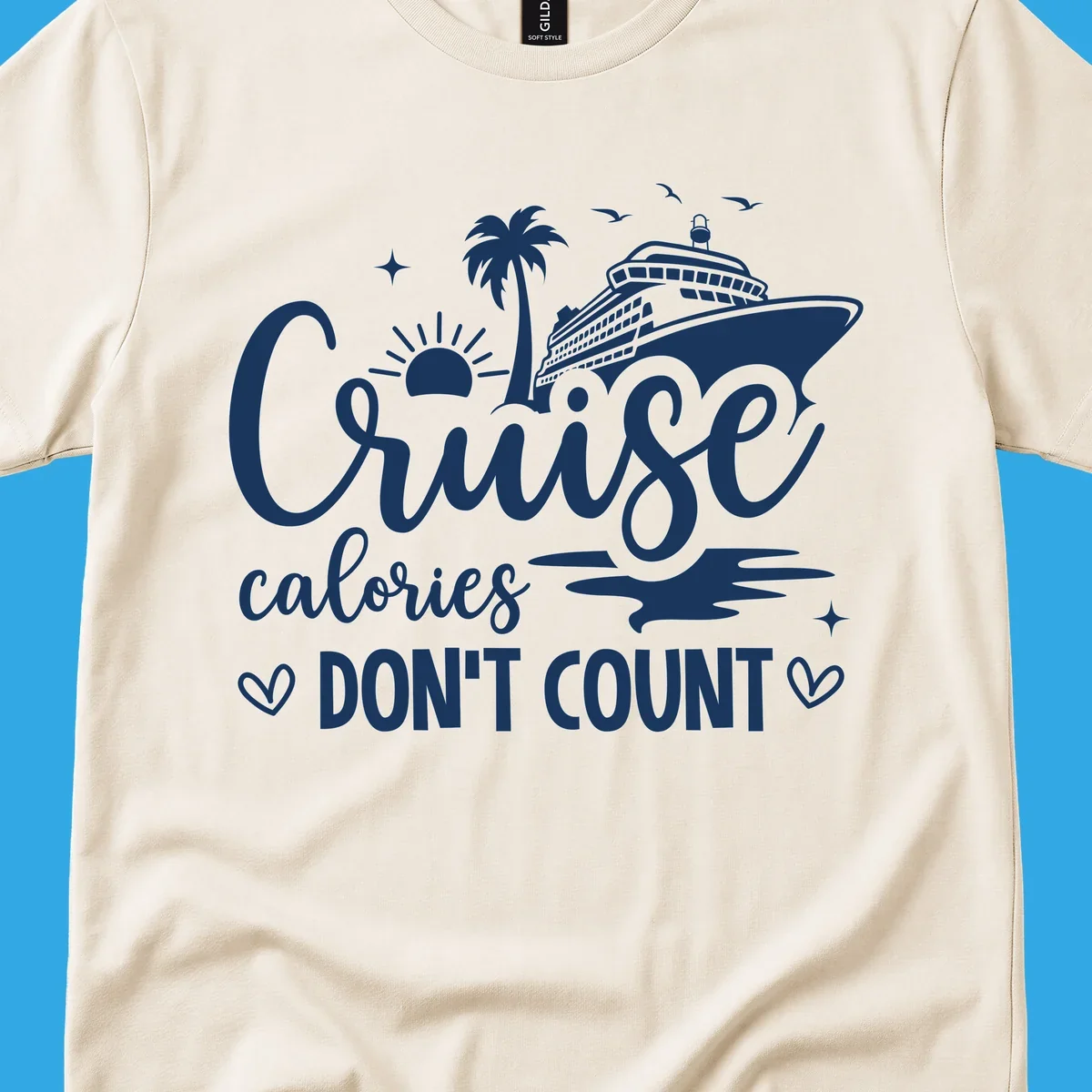 A design for a cruise shirt with a ship, palm tree, sun, and birds, and the text 'Cruise calories DON'T COUNT'.