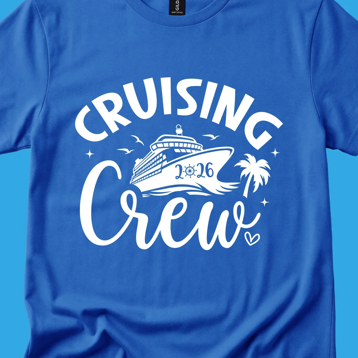 A white and dark blue design for a cruising crew 2026 vacation showing a cruise ship, palm tree, seagulls, and 'CRUISING CREW 2026' text.