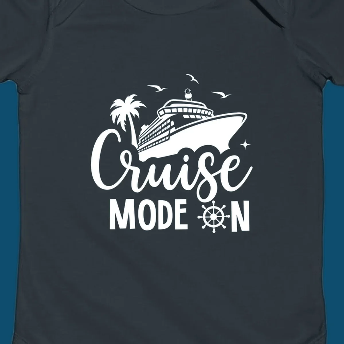 A graphic of a cruise ship, palm tree, and seagulls above the text 'Cruise MODE ON' with a ship's wheel. This is a cruise-mode-on-ship design.