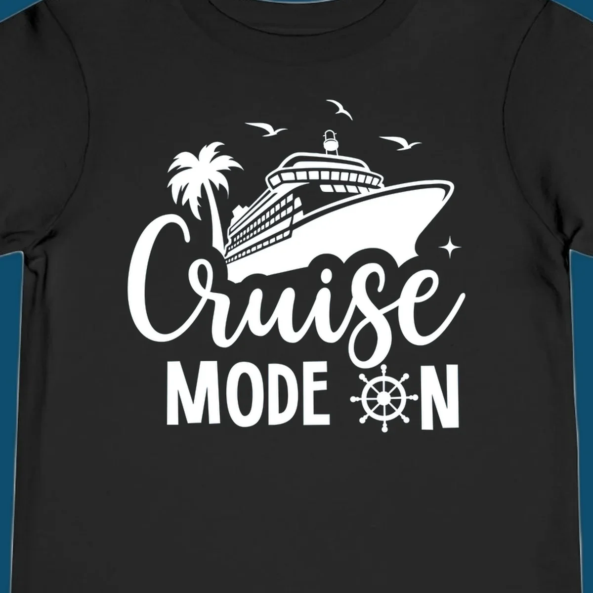 A graphic of a cruise ship, palm tree, and seagulls above the text 'Cruise MODE ON' with a ship's wheel. This is a cruise-mode-on-ship design.