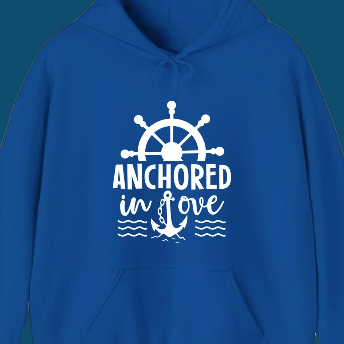 A graphic featuring a ship wheel above the text 'ANCHORED in love' with an anchor and waves below, ideal for an anchored-in-love-cruise.