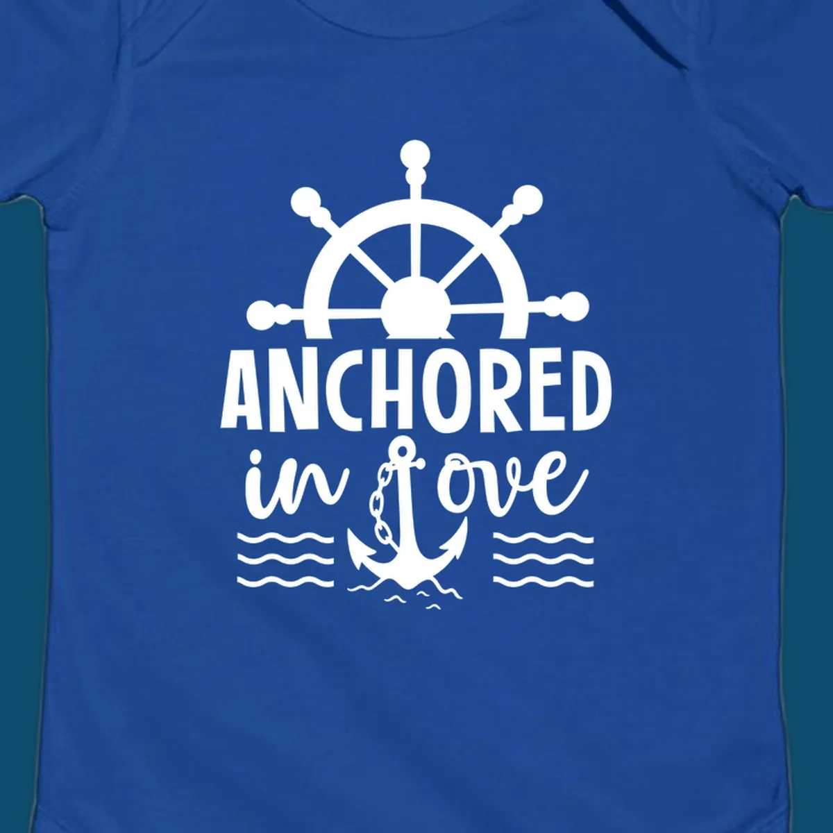 A graphic featuring a ship wheel above the text 'ANCHORED in love' with an anchor and waves below, ideal for an anchored-in-love-cruise.