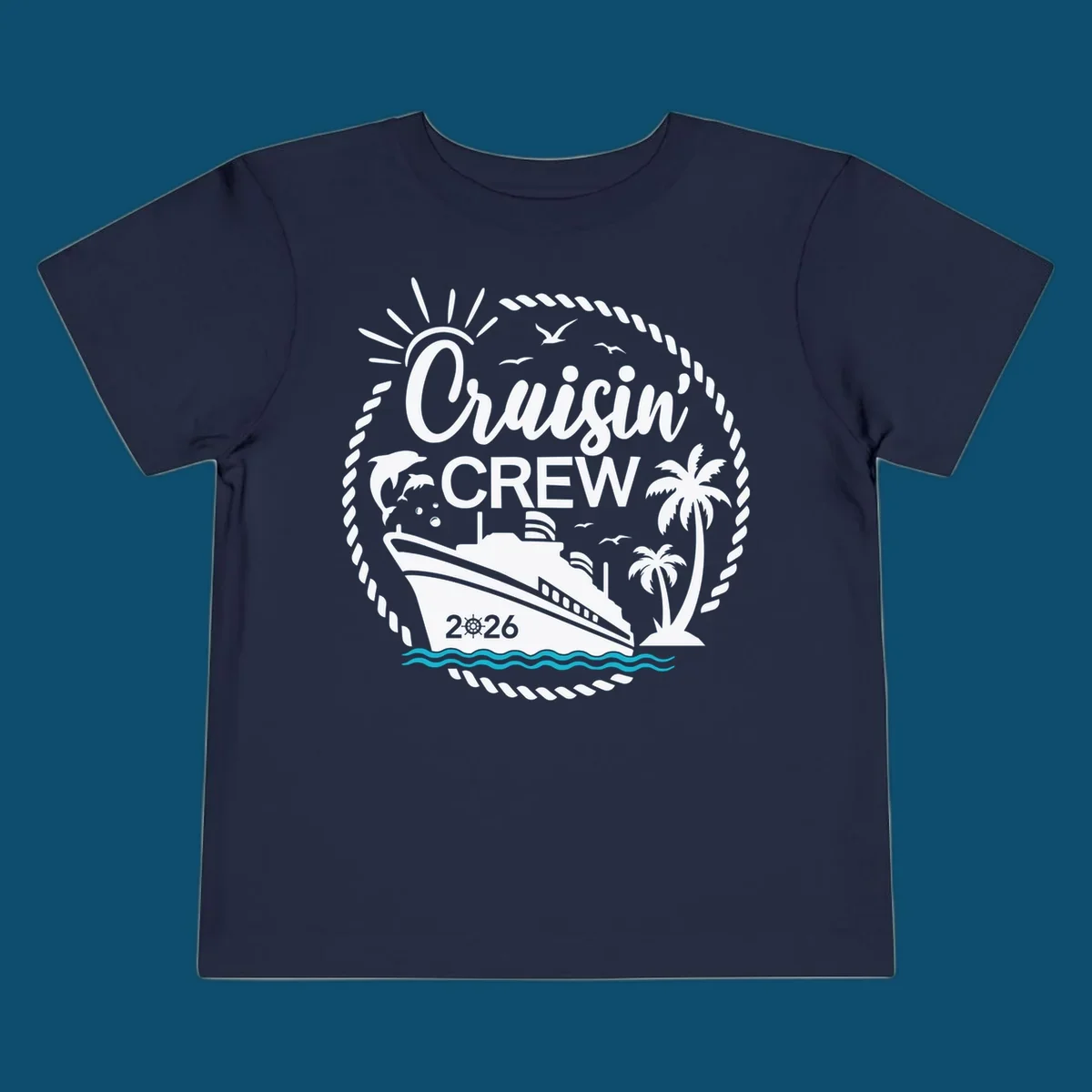 A circular Cruisin' Crew 2026 design with a cruise ship, dolphin, palm trees, sun, and rope border.