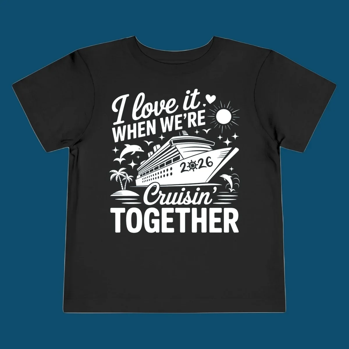 A white and dark blue cruise ship design with "I love it WHEN WE'RE Cruisin' TOGETHER" and "2026", showing dolphins and palm trees, symbolizing a love-cruisin-together-2026 vacation.