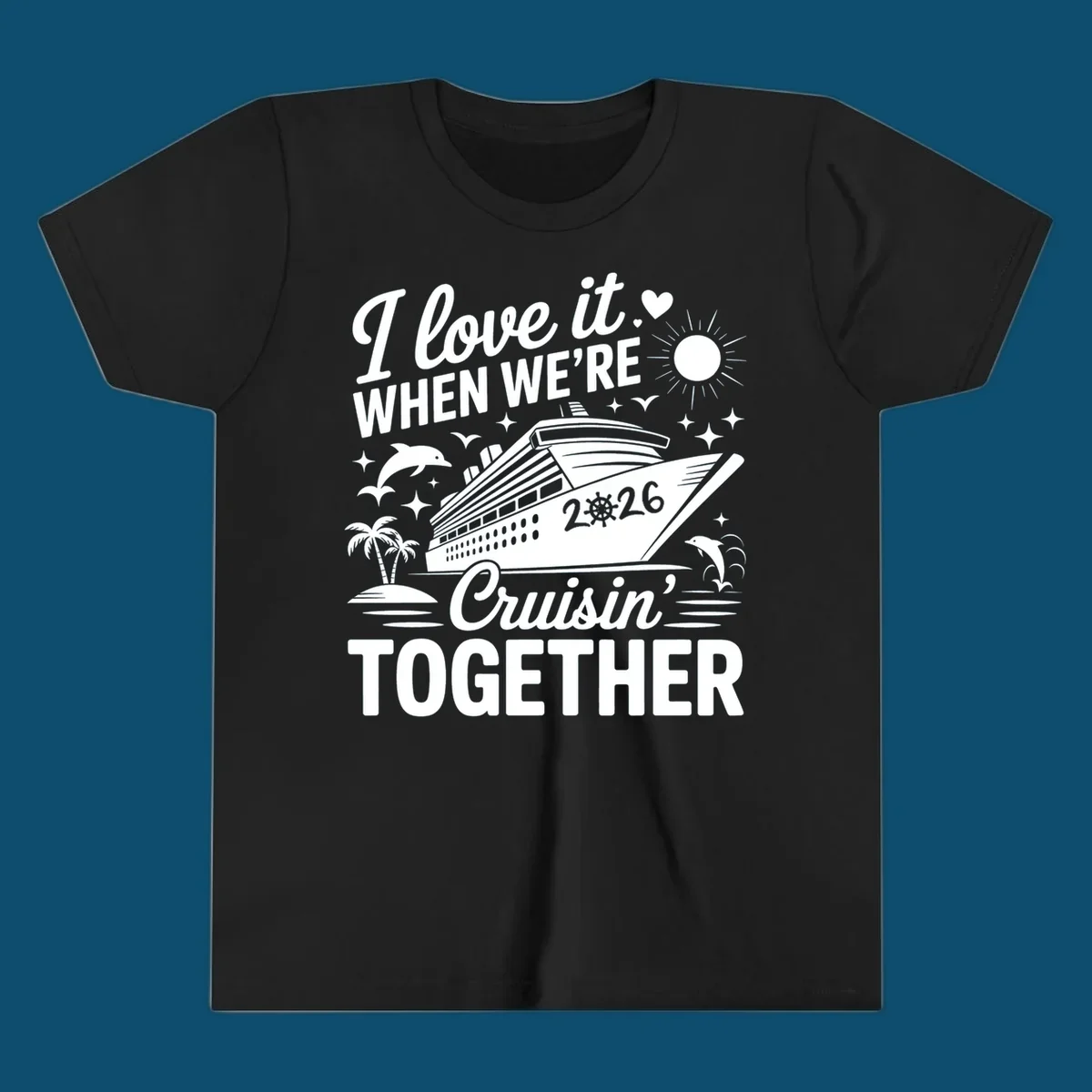A white and dark blue cruise ship design with "I love it WHEN WE'RE Cruisin' TOGETHER" and "2026", showing dolphins and palm trees, symbolizing a love-cruisin-together-2026 vacation.