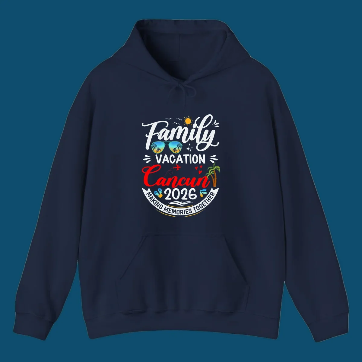 A vibrant "Family Cancun Vacation 2026" t-shirt design with a sun, birds, sunglasses, airplane, hearts, and palm trees.
