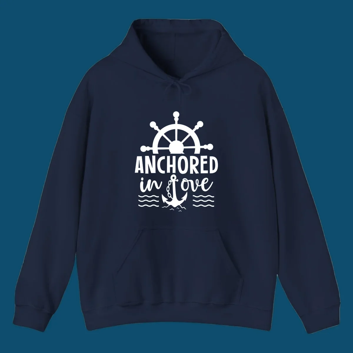 A 'Anchored in love cruise' design with a ship's wheel, the text ANCHORED in love, an anchor, and ocean waves.
