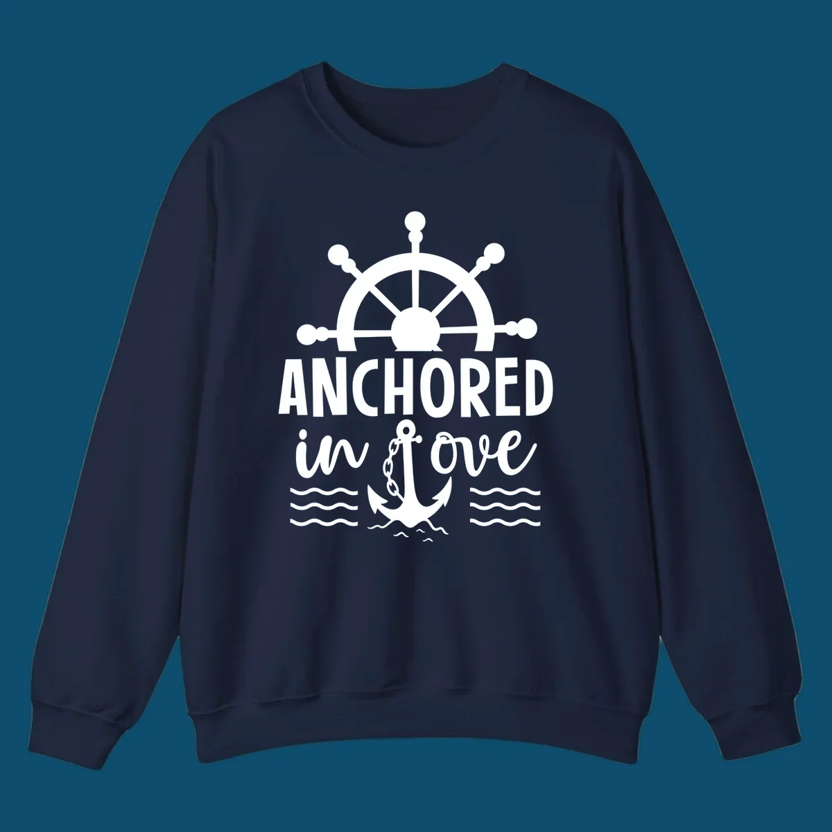 A 'Anchored in love cruise' design with a ship's wheel, the text ANCHORED in love, an anchor, and ocean waves.
