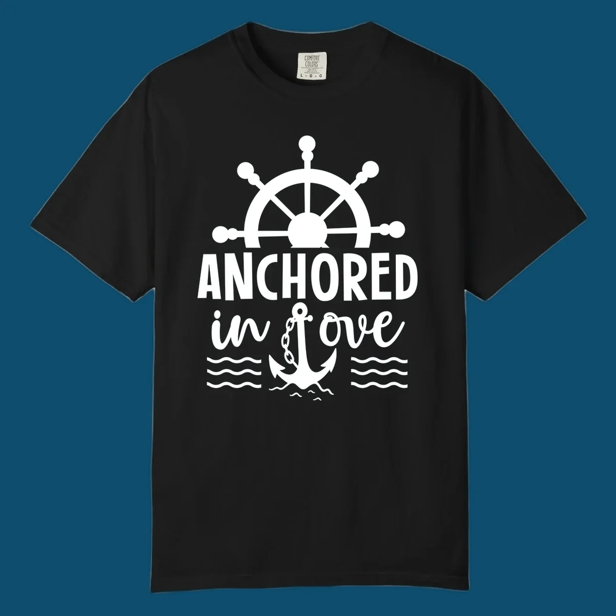 A graphic featuring a ship wheel above the text 'ANCHORED in love' with an anchor and waves below, ideal for an anchored-in-love-cruise.