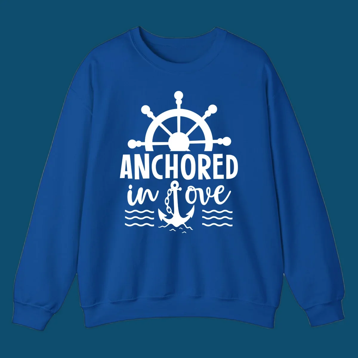 A graphic featuring a ship wheel above the text 'ANCHORED in love' with an anchor and waves below, ideal for an anchored-in-love-cruise.