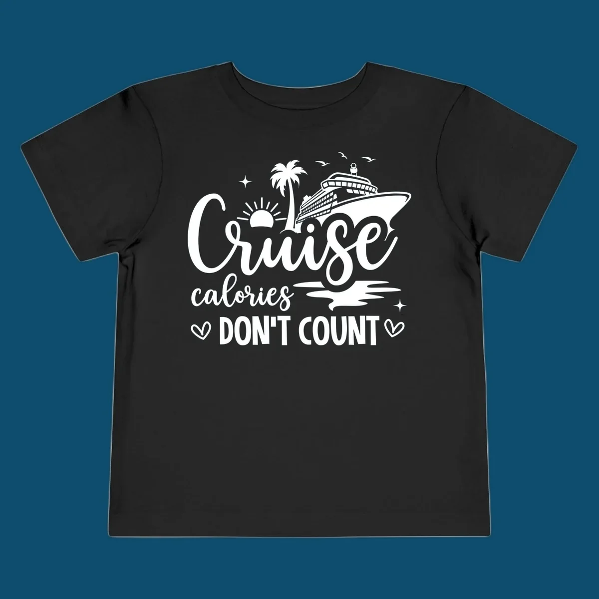 A white graphic of a cruise ship, palm tree, sun, and birds with text 'Cruise calories DON'T COUNT' for a cruise-calories-dont-count design.