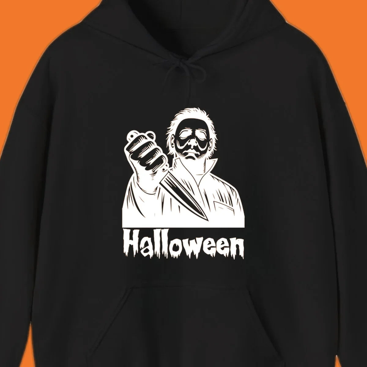 Michael Myers holding a knife with the word Halloween below - michael myers halloween