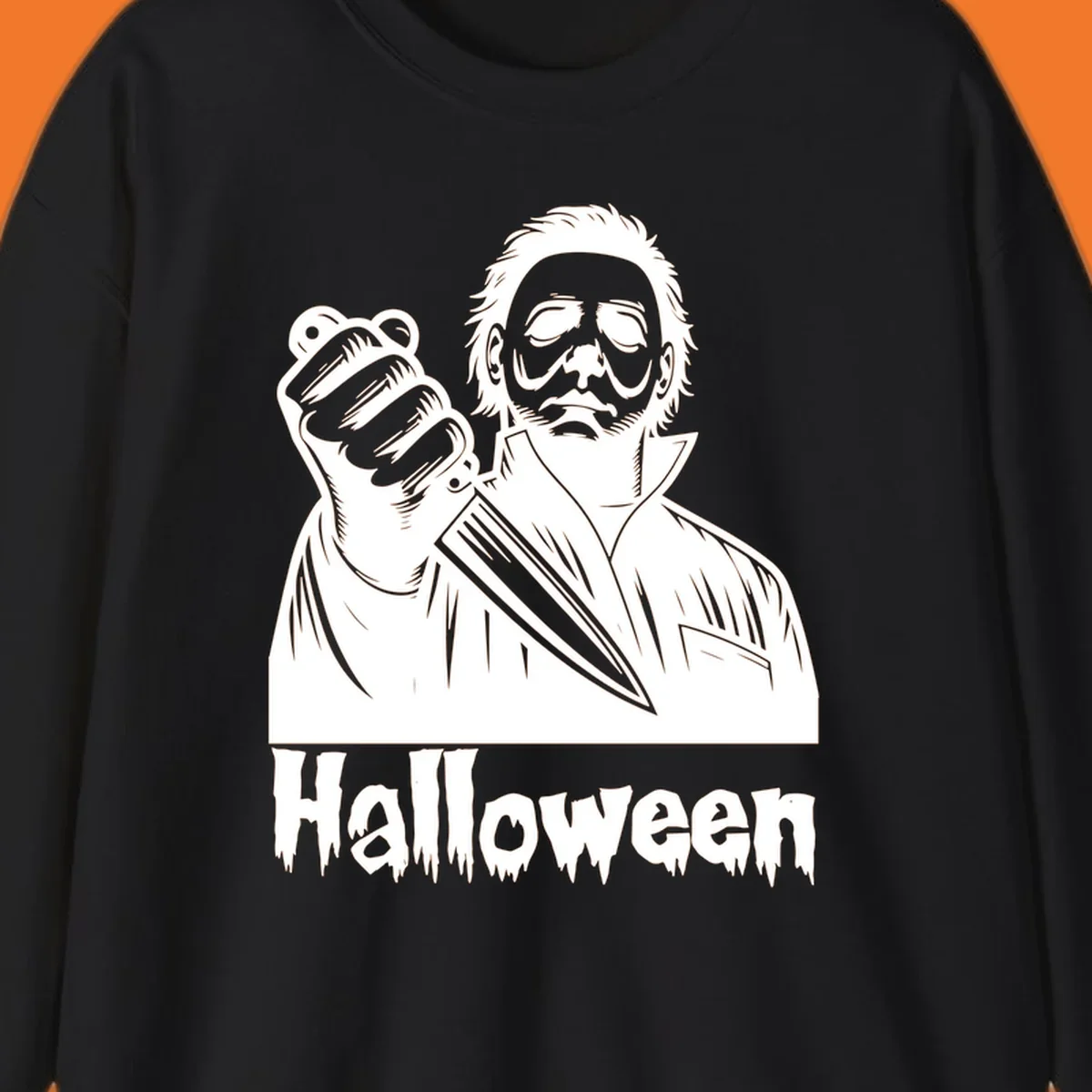 Michael Myers holding a knife with the word Halloween below - michael myers halloween