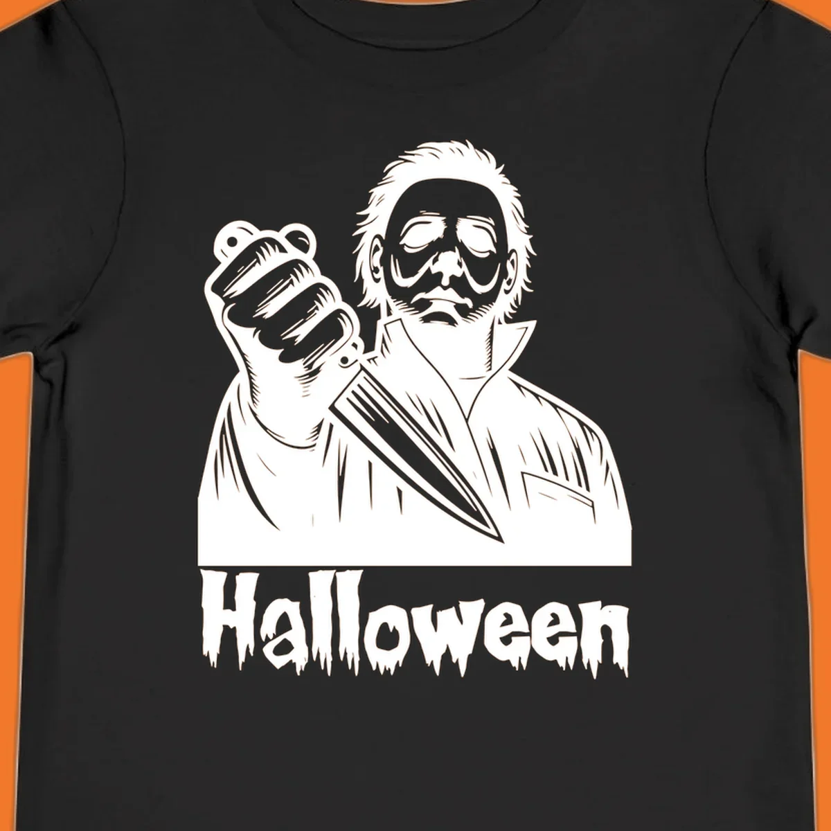 Michael Myers holding a knife with the word Halloween below - michael myers halloween