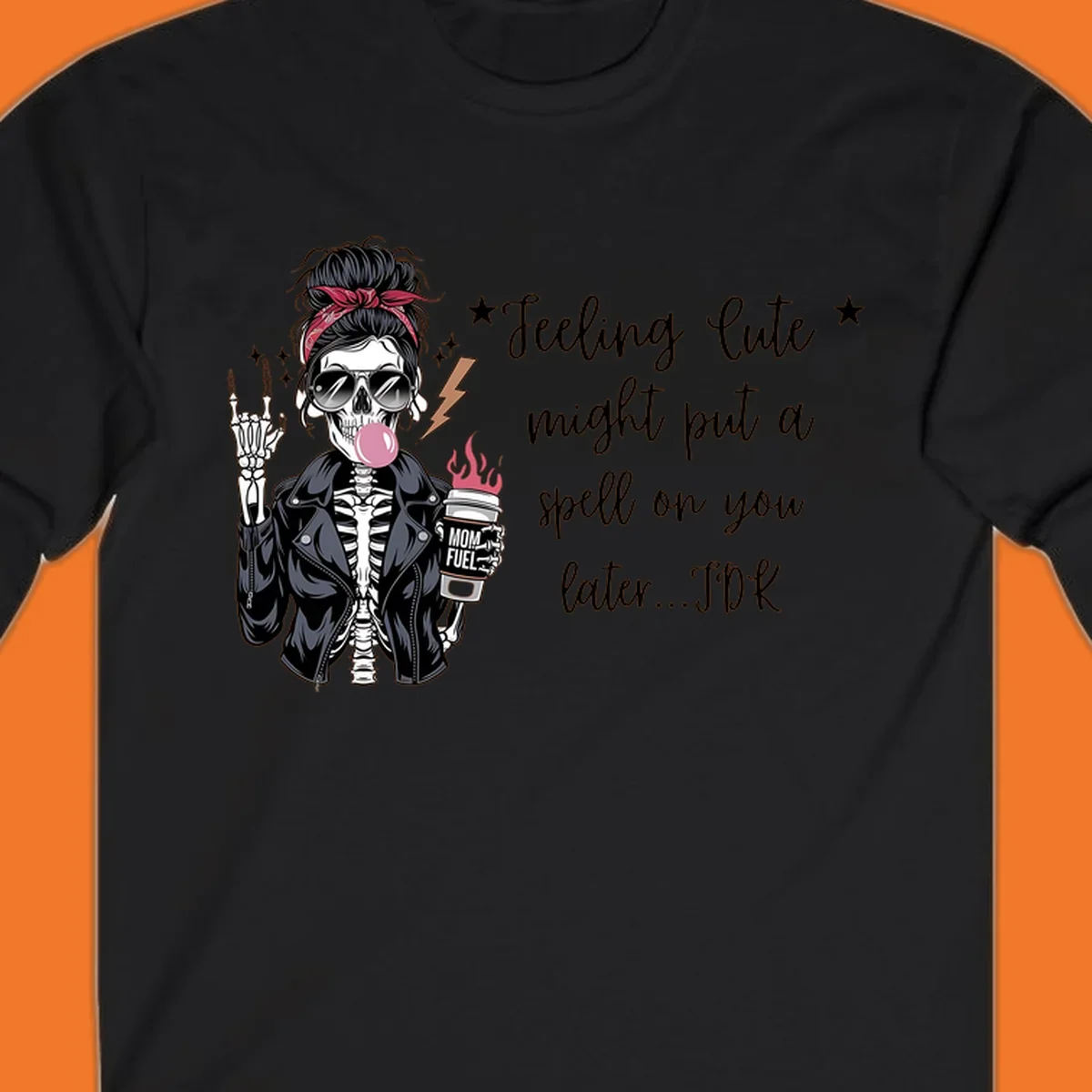 Skeleton mom blowing bubble gum with 'Mom Fuel' coffee, text 'Feeling Cute might put a spell on you later...IDK', halloween graphic.