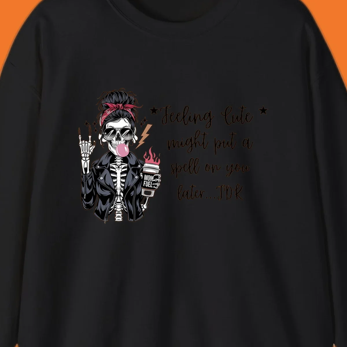Skeleton mom blowing bubble gum with 'Mom Fuel' coffee, text 'Feeling Cute might put a spell on you later...IDK', halloween graphic.