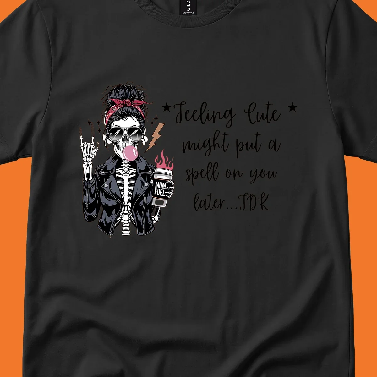Skeleton mom blowing bubble gum with 'Mom Fuel' coffee, text 'Feeling Cute might put a spell on you later...IDK', halloween graphic.