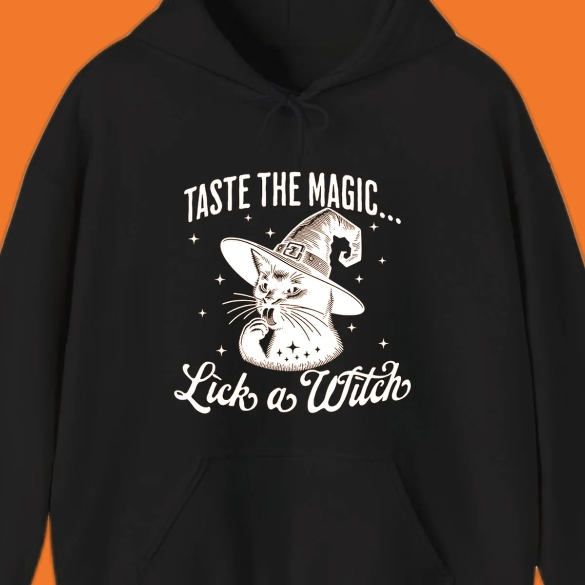 Illustration of a witch cat with text 'Taste The Magic... Lick a Witch', featuring the lick-a-witch-cat concept.