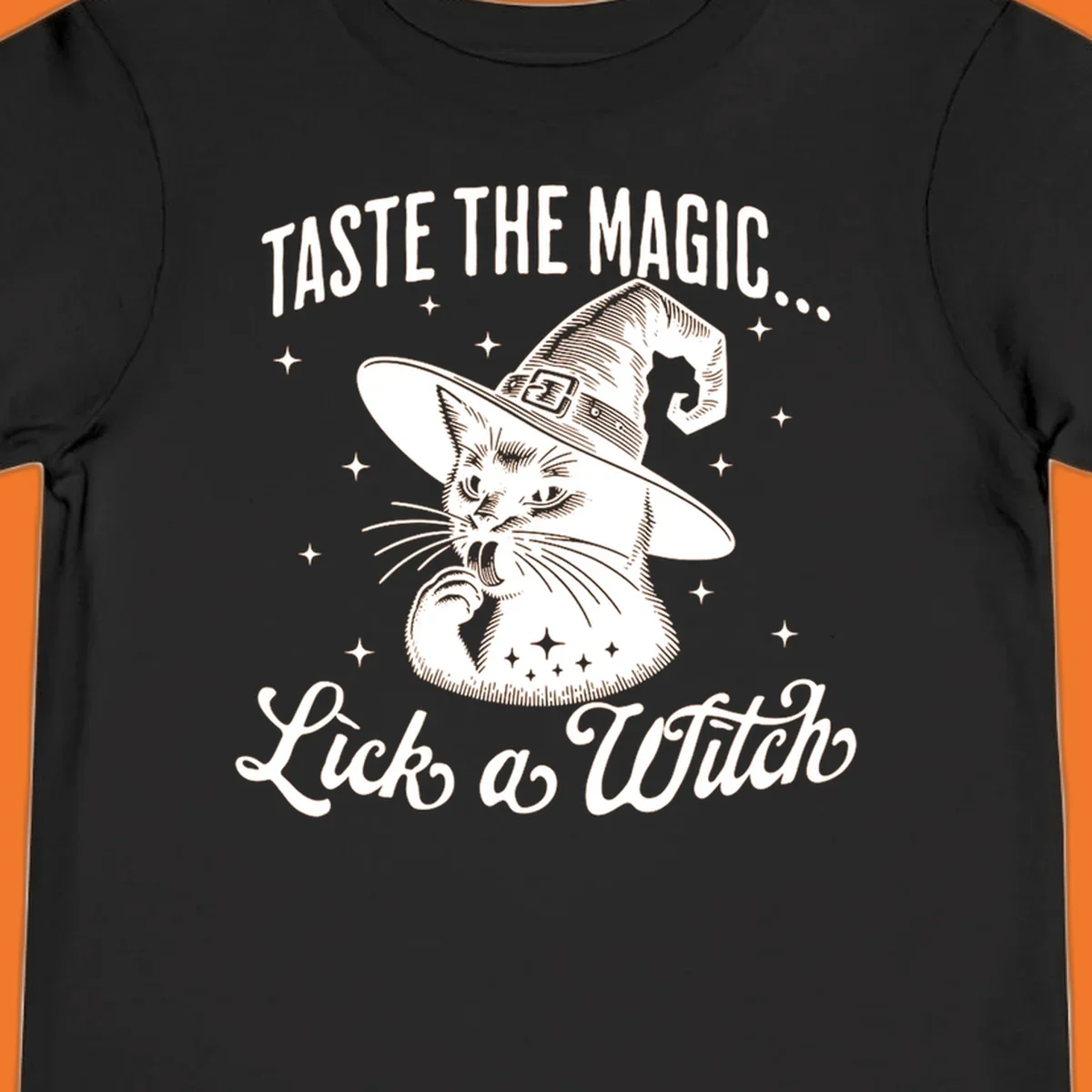 Illustration of a witch cat with text 'Taste The Magic... Lick a Witch', featuring the lick-a-witch-cat concept.
