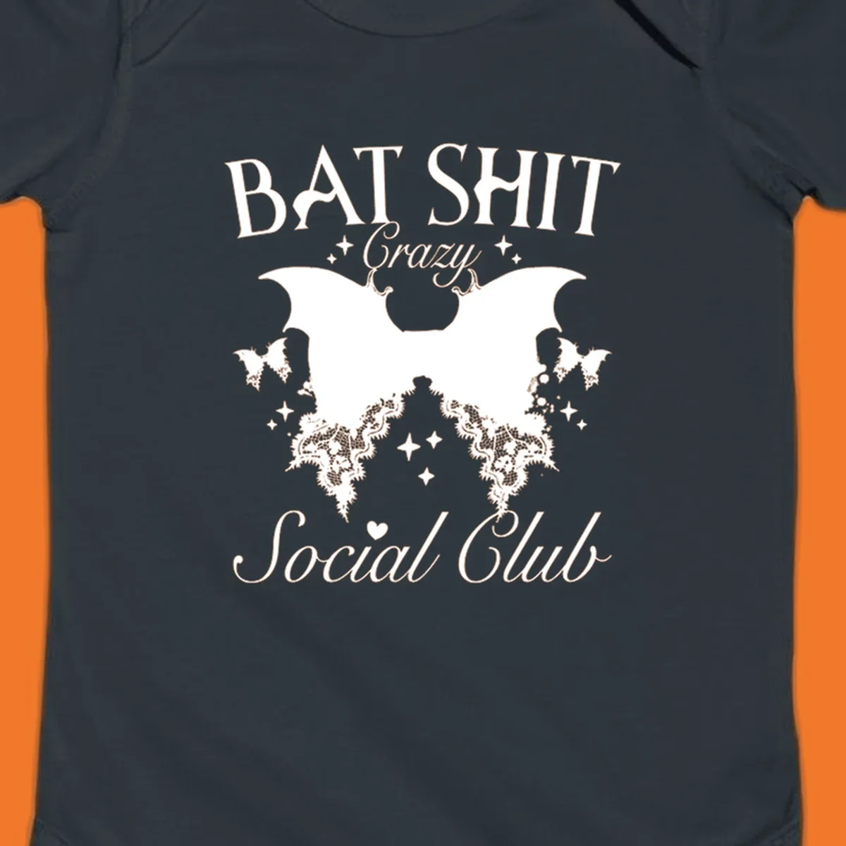 Bat Shit Crazy Social Club design with bat wings, lace, and text.